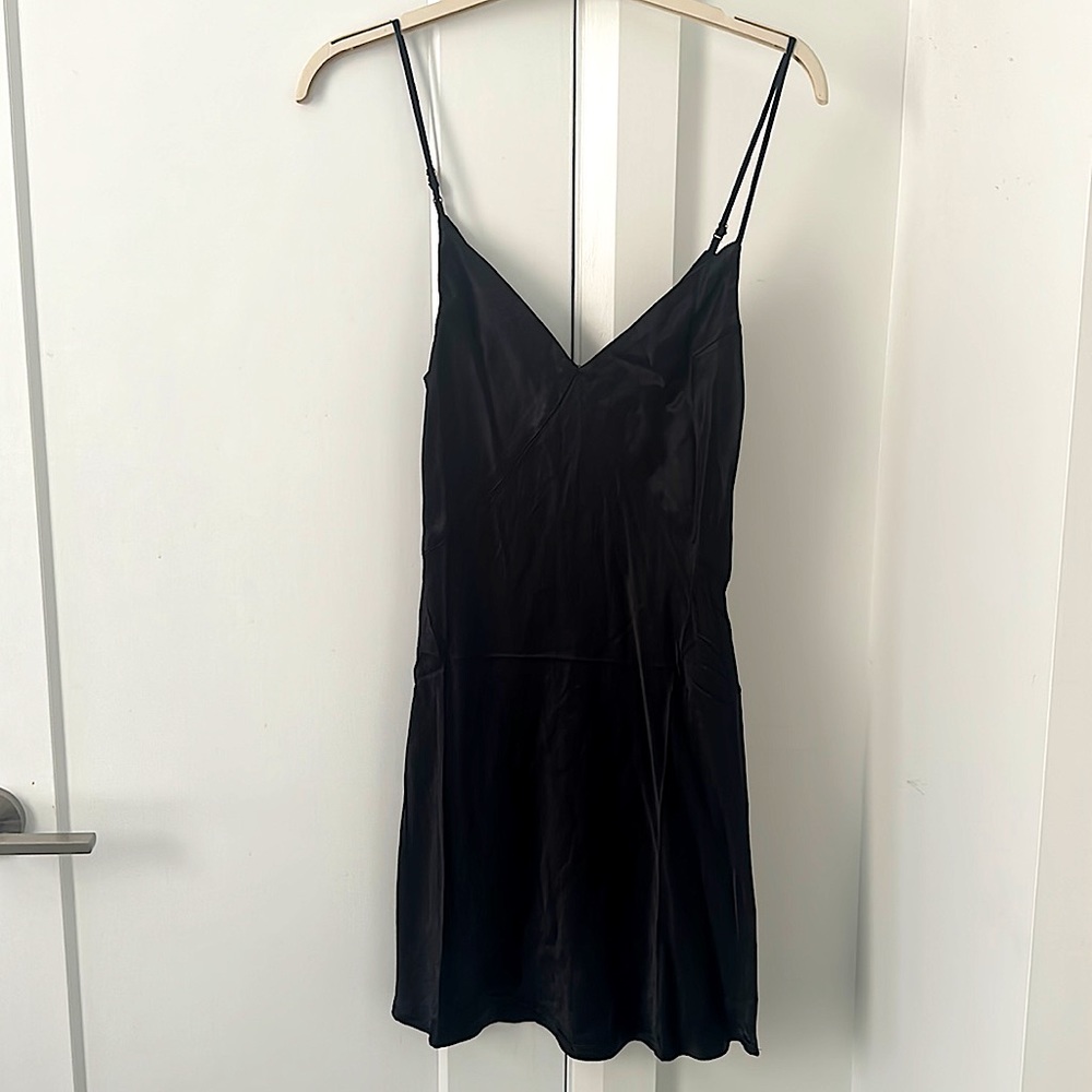 DISSH black satin mini dress. Never worn. Tags on. Perfect condition.